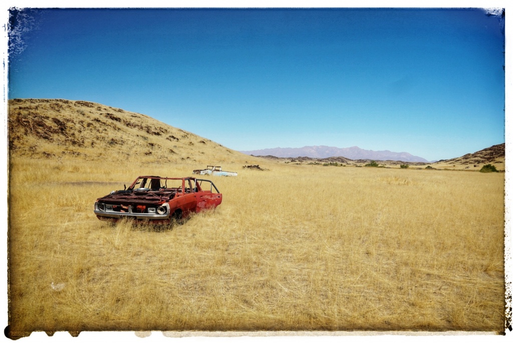 more old cars in namibian desert just left to rot